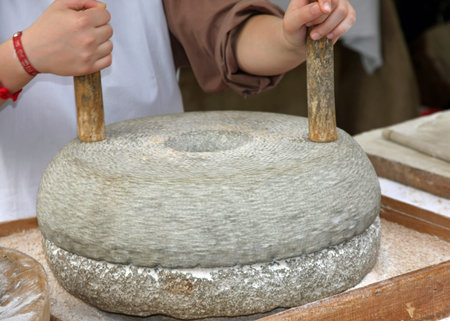ancient millstone for grinding wheat and seeds to make flour