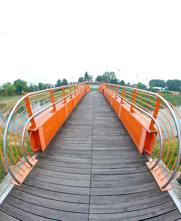 pedestrian cycle bridge to cross the riverの写真素材