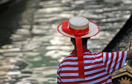 detail of the hat and striped Jersey of the Venetian gondolier in Veniceの写真素材