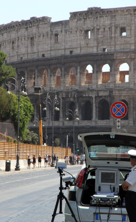 Police patrol for speed control in Via dei Fori imperiali in Romeのeditorial素材