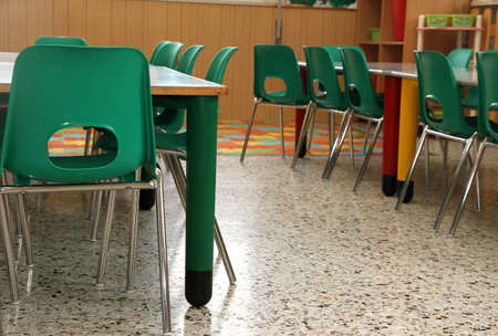 particular of a classroom in a kindergarten with little green chairs for the childrenのeditorial素材