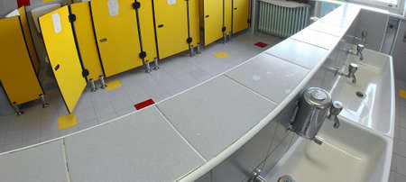 small sink with stainless steel basin taps and baths in a kindergartenの写真素材