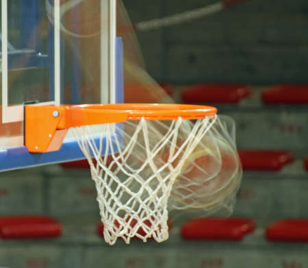 movement of basketball while enters the basket NETの写真素材