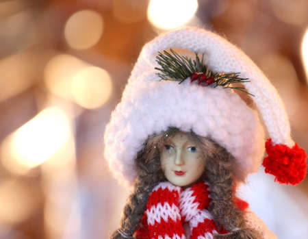 Statue of woman with hat of Santa Claus during Christmas holidaysの写真素材