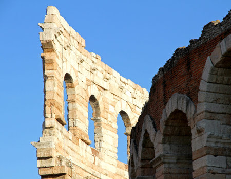 detail of the ancient Roman landmark building in brick and lime and blue skyの写真素材