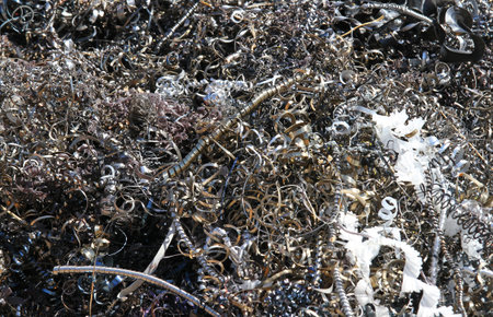 curls and shavings discarded pieces of iron and zinc in dump of metallic material 9