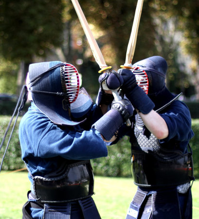 two warriors of kendo fighting lottanon with bamboo swords