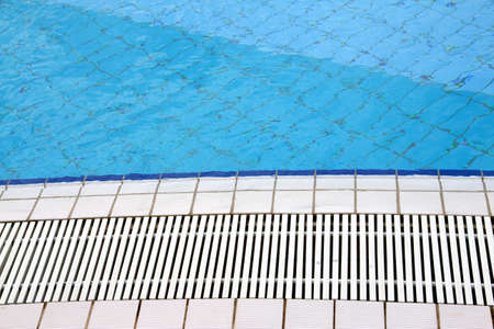 swimming pool with water recovery in the tourist villageの写真素材