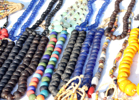 pearl necklaces in antique market in a stand
