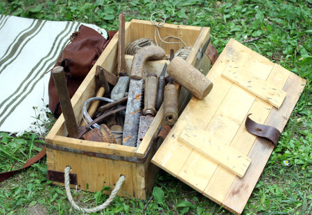basket with antique rust working tools for carpenters and Farriersの写真素材