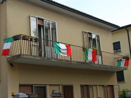 Italian House decked out with many flags before the World Cup football matchのeditorial素材