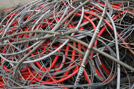 piles of scrapped electrical cables in electrical discharge