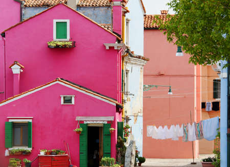 pink houses on the island of BURANO near Venice in Italyのeditorial素材