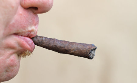 smoker with long cigar in mouth