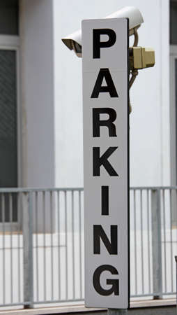written PARKING of a car park monitored by CCTV camerasの写真素材