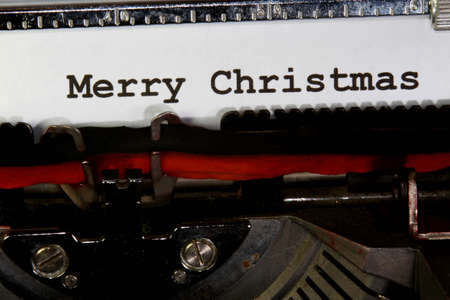 MERRY CHRISTMAS written with black ink with the typewriterの写真素材