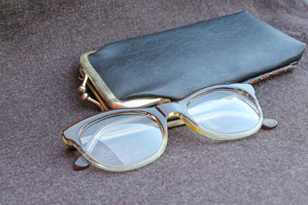 glasses of an old woman with black leather caseの写真素材