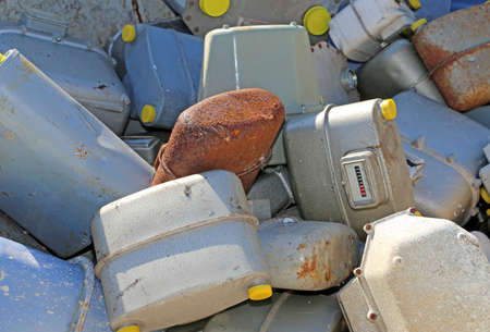 old rusted gas counters in a special waste landfill in Eastern Europeの写真素材