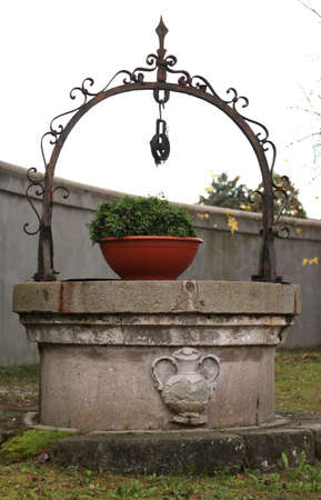 ancient medieval marble well in the courtyard of the Castleのeditorial素材