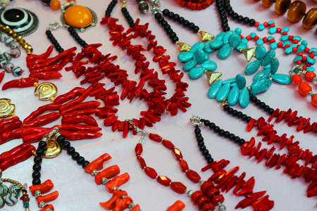 red necklace with pearls  on sale in the marketの写真素材