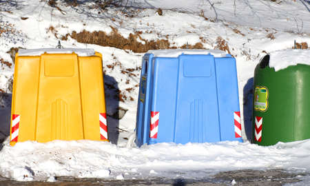 big bins for waste paper and used glass bottlesの写真素材