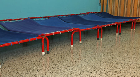 little beds of a dormitory of kindergarten children