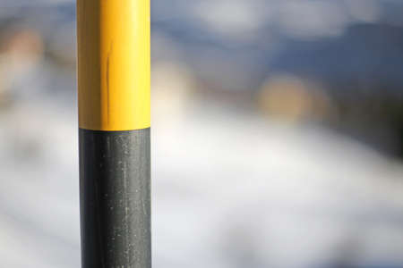 black and yellow pole in the mountainの写真素材