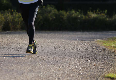 marathon runner during the marathon race outdoors in winterの写真素材