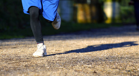 marathon runner during the marathon race outdoors in winter