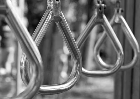 steel rings for gymnastic exercises outdoors in a sports field 2の写真素材
