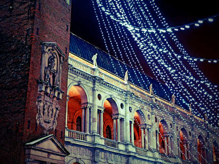 piazza dei signori with the Palladian basilica during a winter nightの写真素材