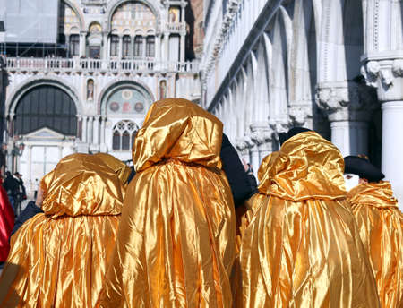 People with Golden costumes for the Carnival in Venice Italyの写真素材