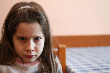 little girl with tear that has just finished cryingの写真素材