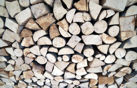 large Woodshed with many logs for the wood-burning stoveの写真素材