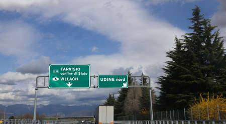 big road signal in the italian highway with directionの写真素材