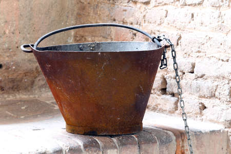 antique copper cauldron in the kitchens of the medieval castleの写真素材