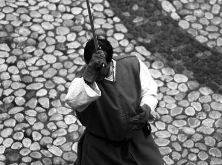ancient medieval soldier with sword during the final duelの写真素材
