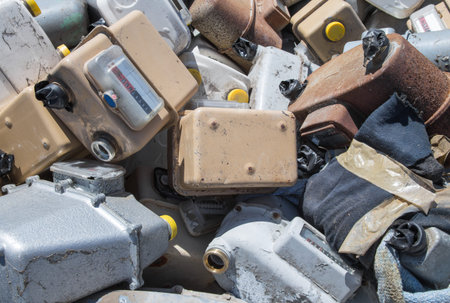 rusted old abandoned gas counters in waste landfill