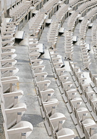 many empty seats in the stands before the sporting event
