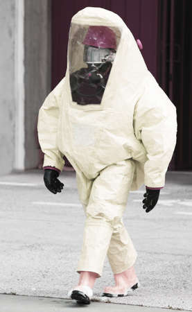 man with yellow suit gear against biological riskの写真素材