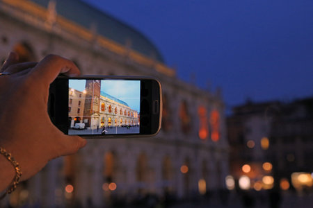 smartphone and an important italian monument
