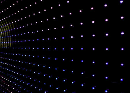 abstract background of many multicolored led lightsの写真素材