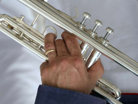 trumpeter with the trumpet in his handの写真素材