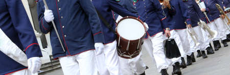Many musicians of the band in full uniform during the paradeの写真素材