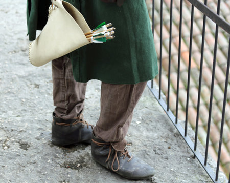 medieval Archer with dangerous  arrows and vintage dress