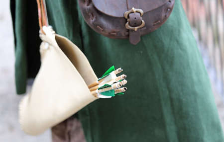 medieval Archer with dangerous  arrows and vintage dressの写真素材