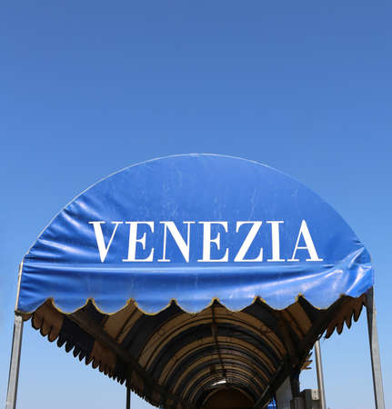 big plastic tent with VENICE written in italianの写真素材