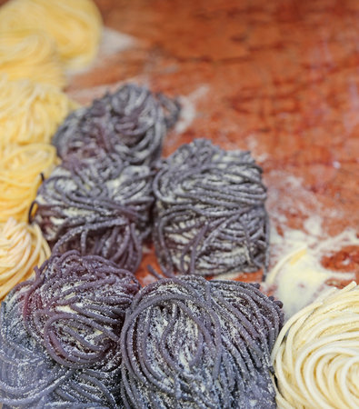 spaghetti and noodles for sale in Italian pasta shopの写真素材