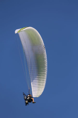 Daredevil pilot with the motor glider flies fast