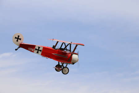 Thiene, Vicenza - Italy. 26th July, 2015: important air show called FlighThiene in Thiene Airport near Vicenza City in Northen Italy with historical airplanes. Red Triplane Fokker DR-1のeditorial素材